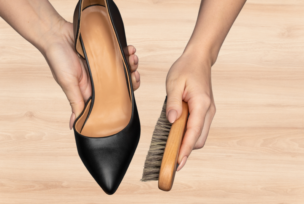 women caring for leather shoe