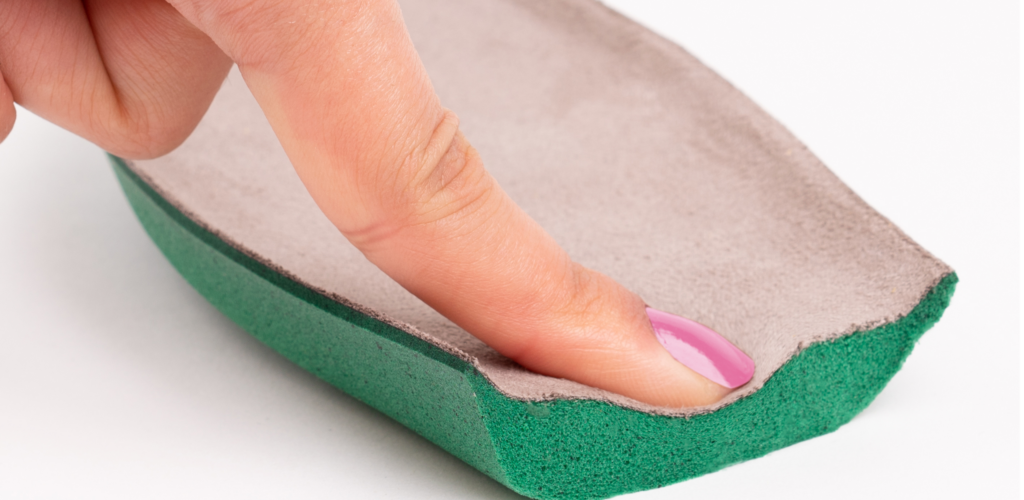 woman touching a cushion, comfortable memory foam footbed