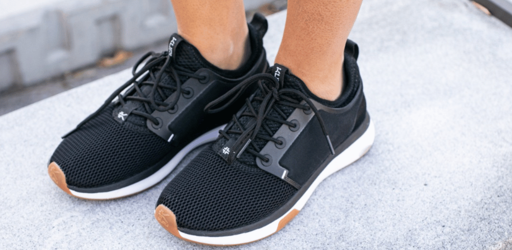 stylish women wearing black kuru Atom sneaker