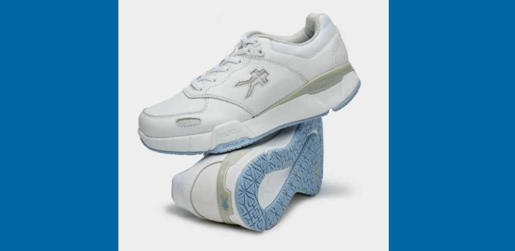 a pair of white Kuru Kinetic slip proof shoes