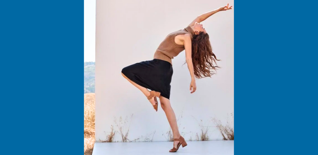 women in cute dress bending backwards in Vionic Chadonnays