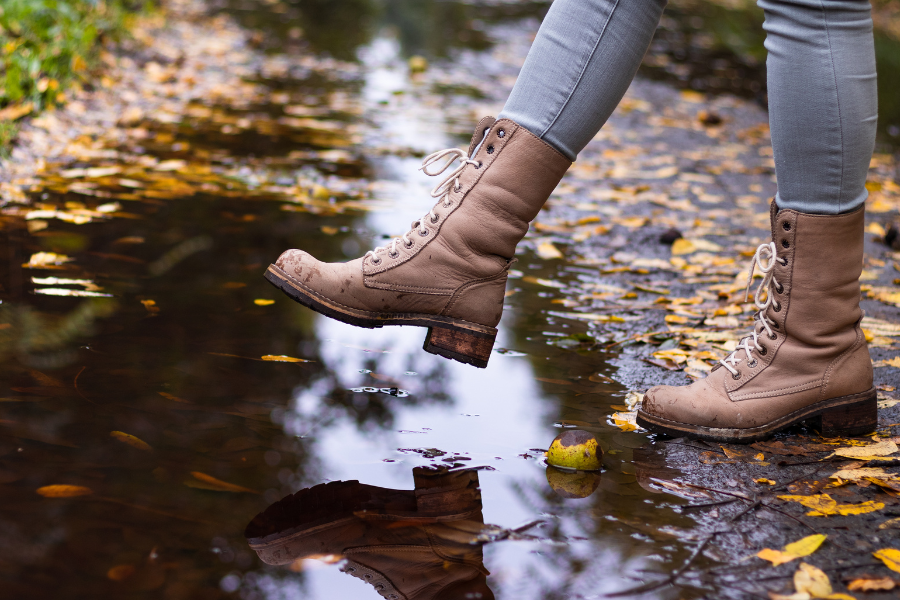 women with leather boots getting wet